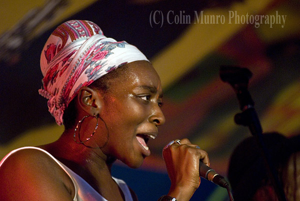 Nana Clara Aldrin-Quaye singing with London based cuban samba, timba and funk fusion band Wara at Exeter's Respect Festival, 2011. Image No. MBI000925.