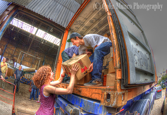 Book-Cycle volunteers load up container with books for Ghana. Colin Munro Photography, image no. MBI000947
