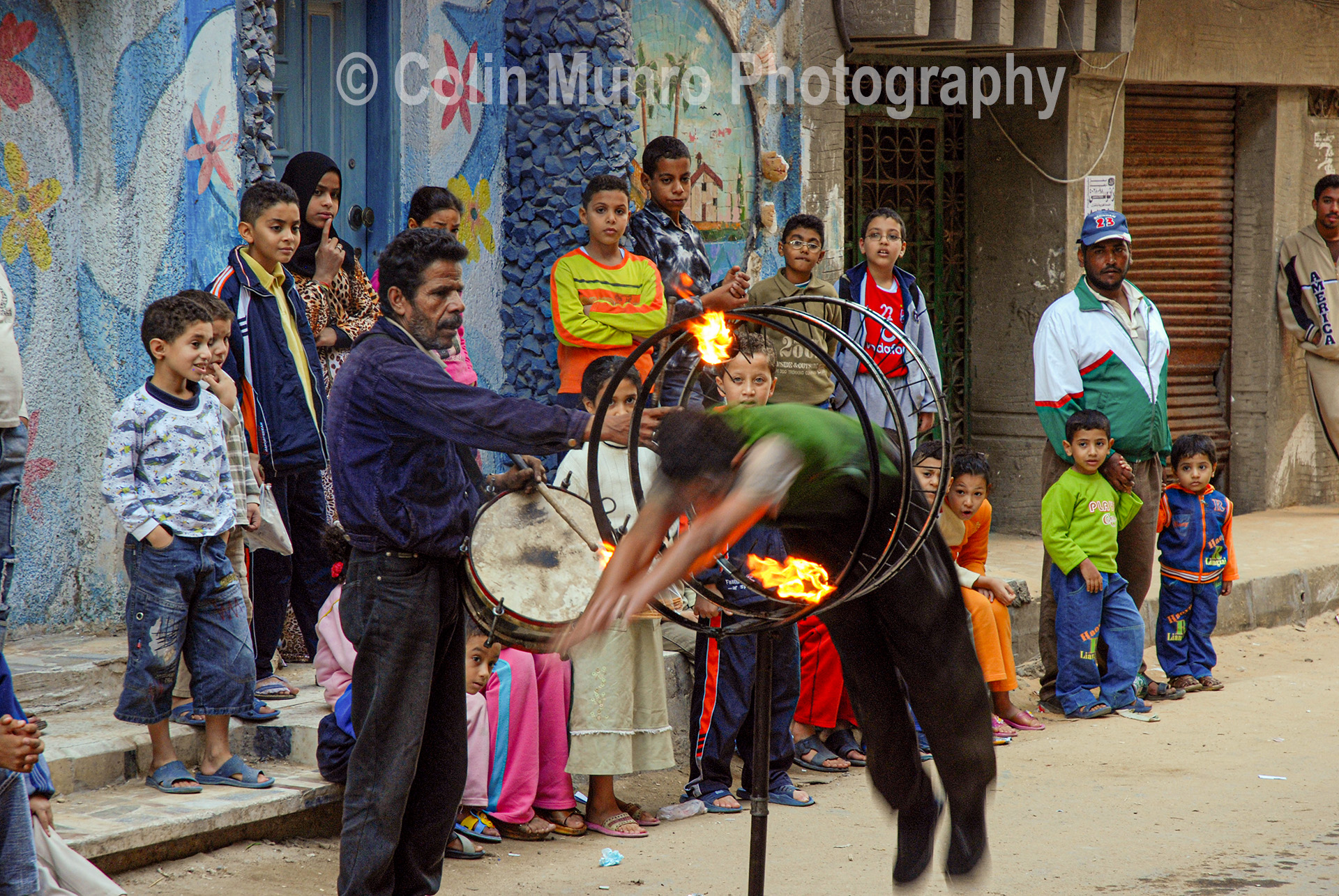 Street performers in the backstreets of Abu Qir seaport, Nile Delta, Egypt. www.colinmunrophotography.com